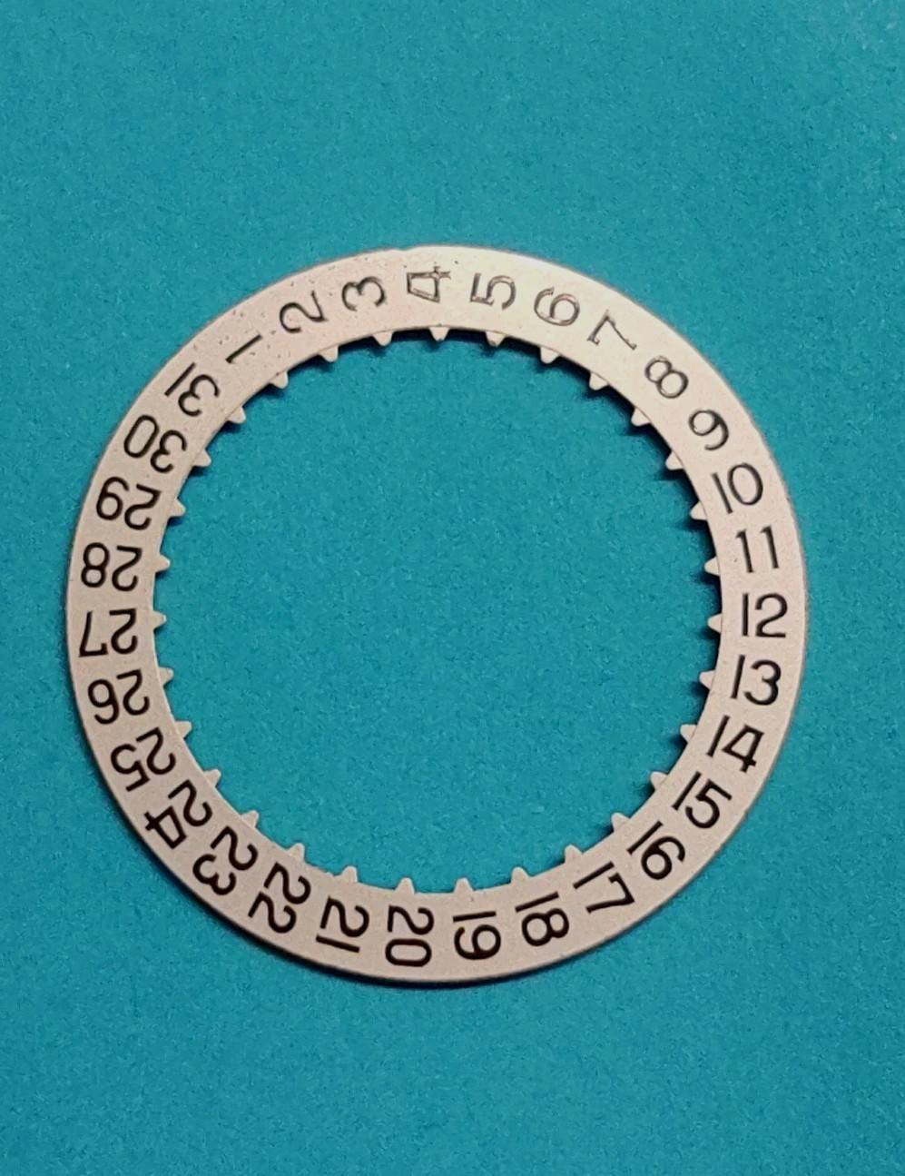 ETERNA Calibre #1438 Date @3 Disc. Part #2557/1. Black On Silver. NOS.