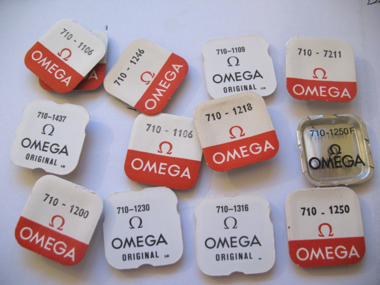 OMEGA 710,711,712 ASSORTED WATCH MOVEMENT PARTS