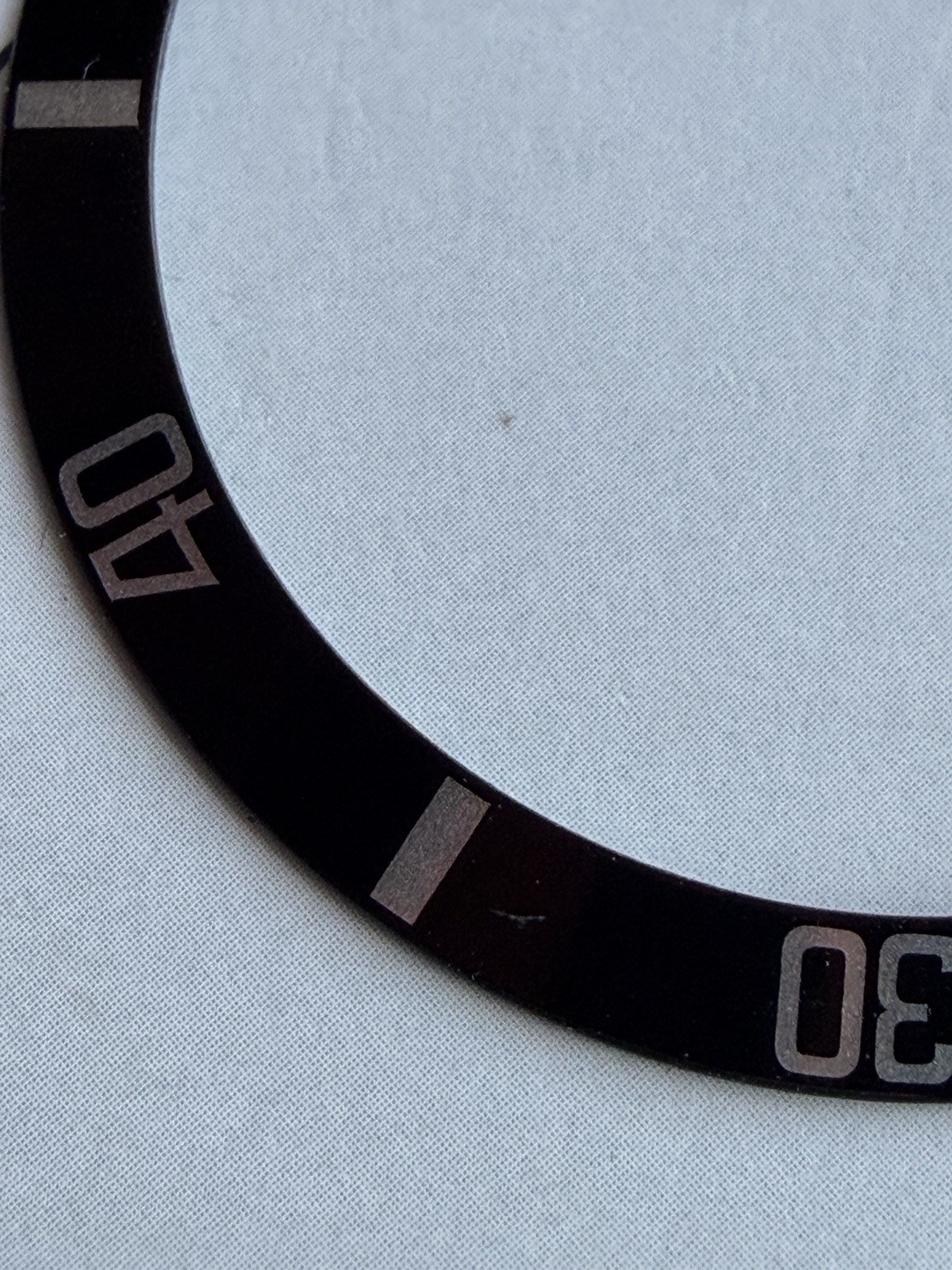 Genuine Rolex 14060/14060M No Date Submariner Bezel Insert , Pre-Owned.