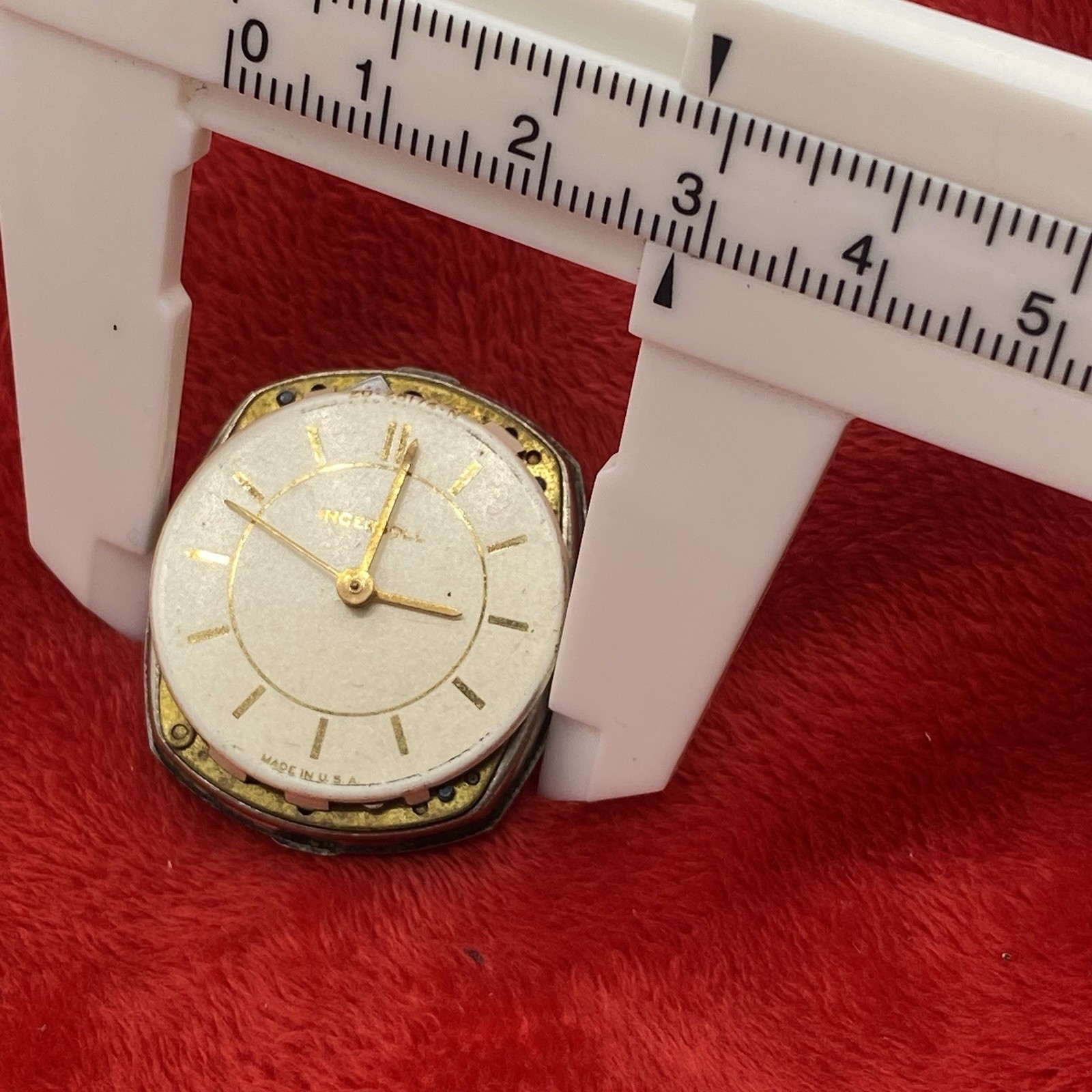 Antique Ingersoll watch movement w dial and hands for parts or repair Made USA
