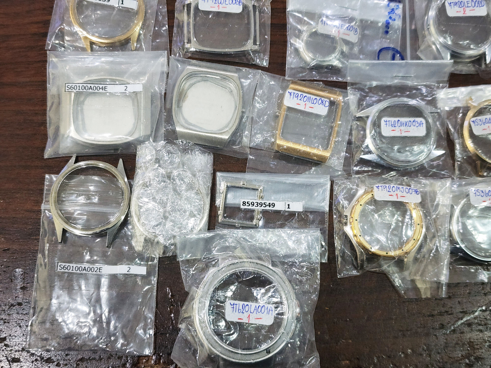 Hugh Lot 35 NOS Case Seiko watch Dress 7T62 Quartz Assorted parts Etc.