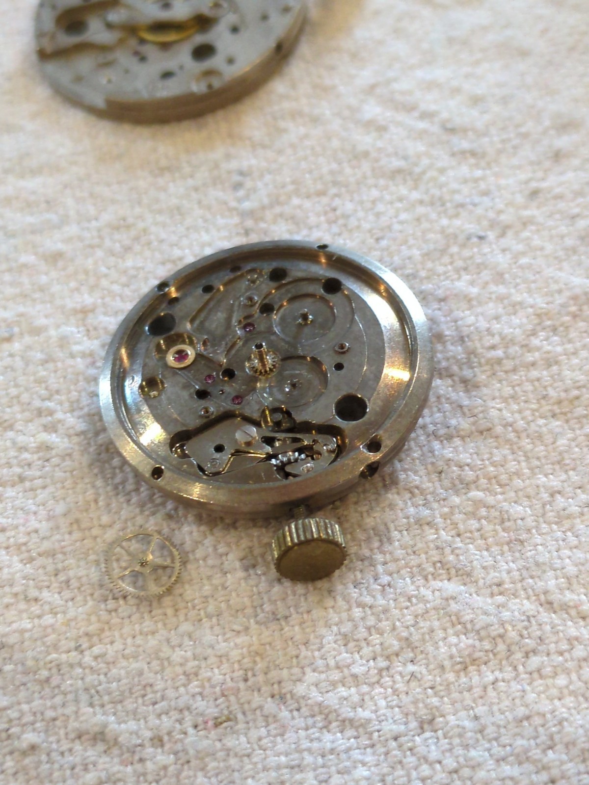 !Lot of 2 watch movements with a Box, Wheels, Plates, Screws, Springs, and more!
