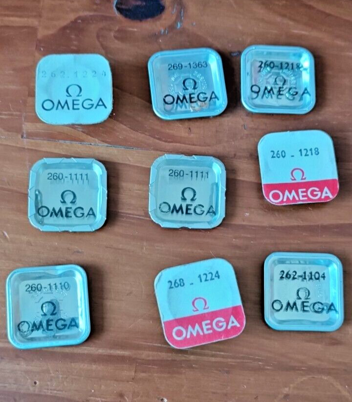 LOT OF 9 OMEGA PARTS CALIBER 260 262 268 & 269 NOS PARTS