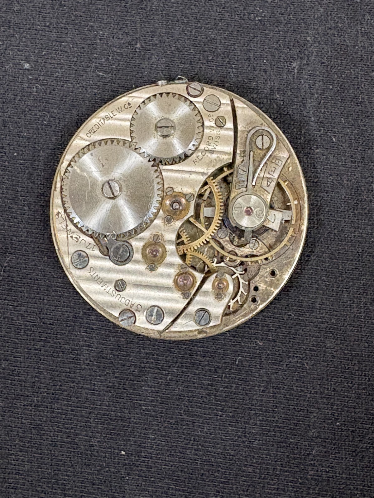 ANTIQUE POCKET WATCH MOVEMENT FOR PARTS OR REPAIR SWISS MADE CREDITABLE 17 JEWEL