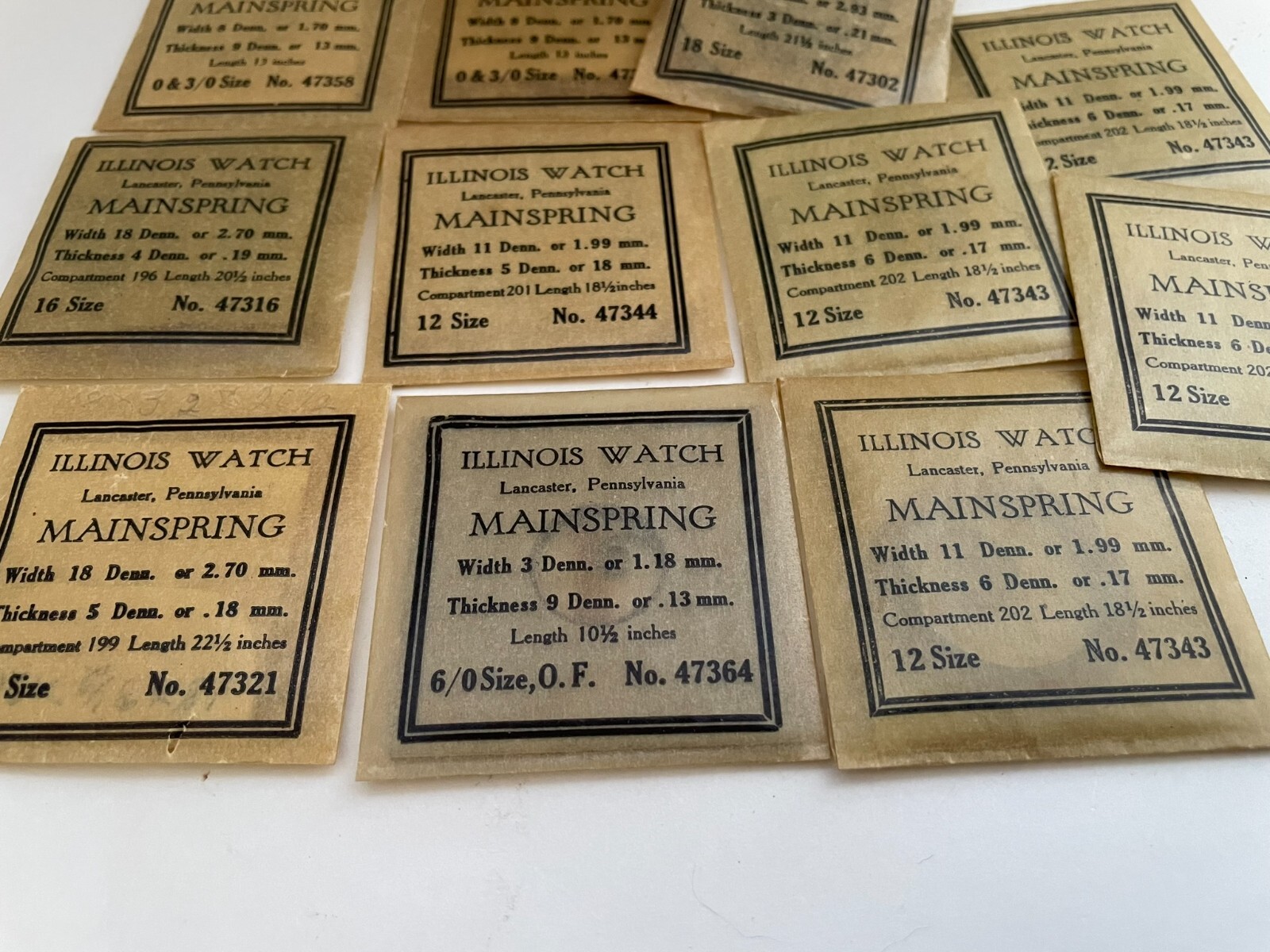 Collection of 11 Illinois Watch Mainsprings of various sizes