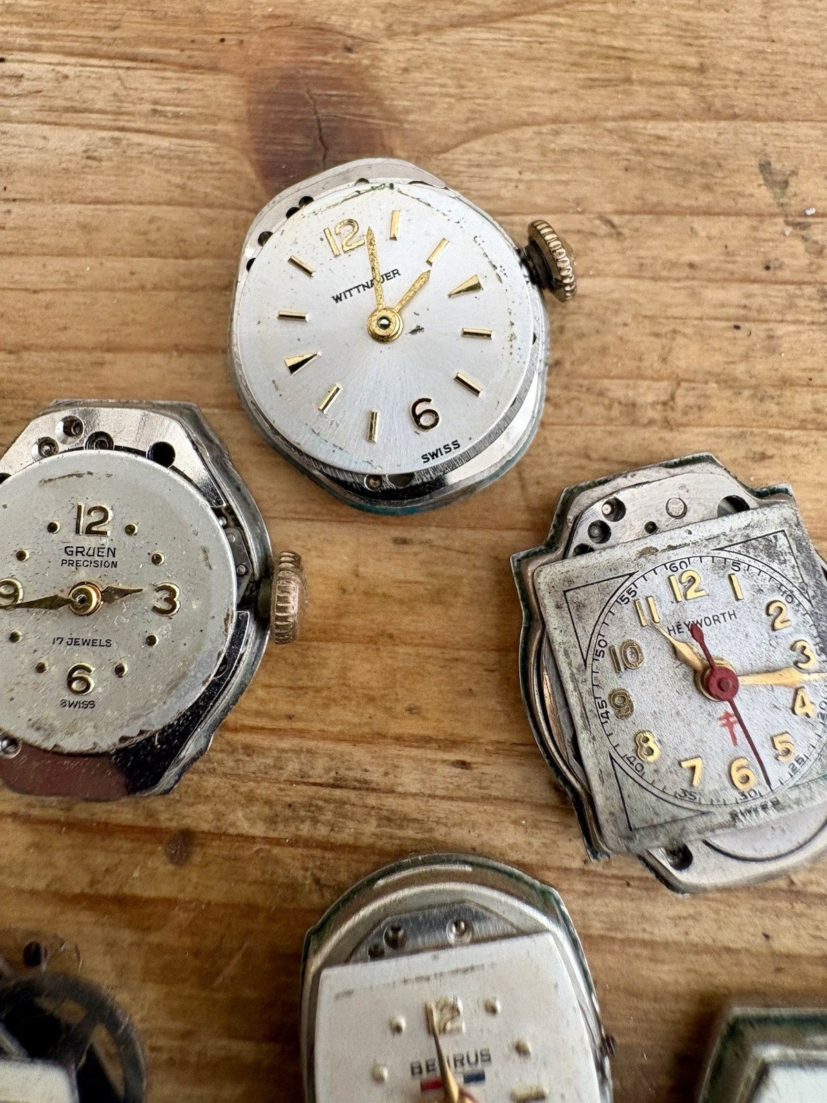 Watchmaker parts Lot w/ Box Movements Dials Gears Bulova Omega Benrus Elgin