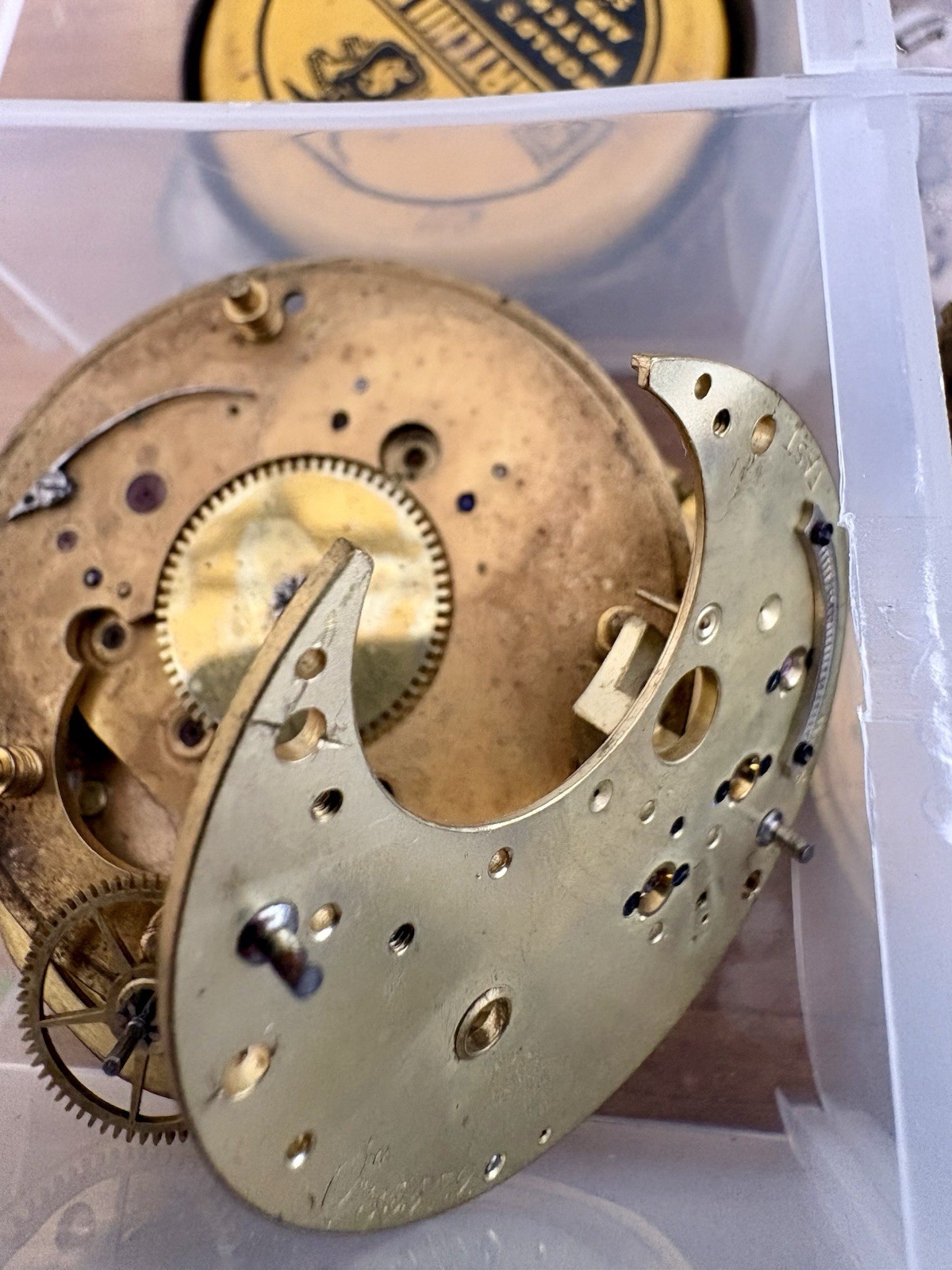 Watchmaker parts Lot w/ Box Movements Dials Gears Bulova Omega Benrus Elgin