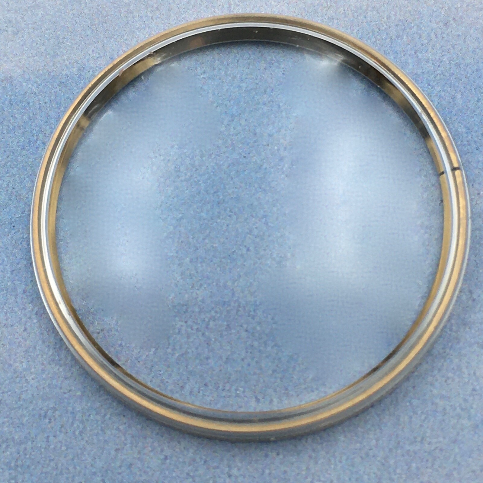 Genuine Omega Crystal # 2688 W/ Retainer Ring 21.10 mm. Open Package.