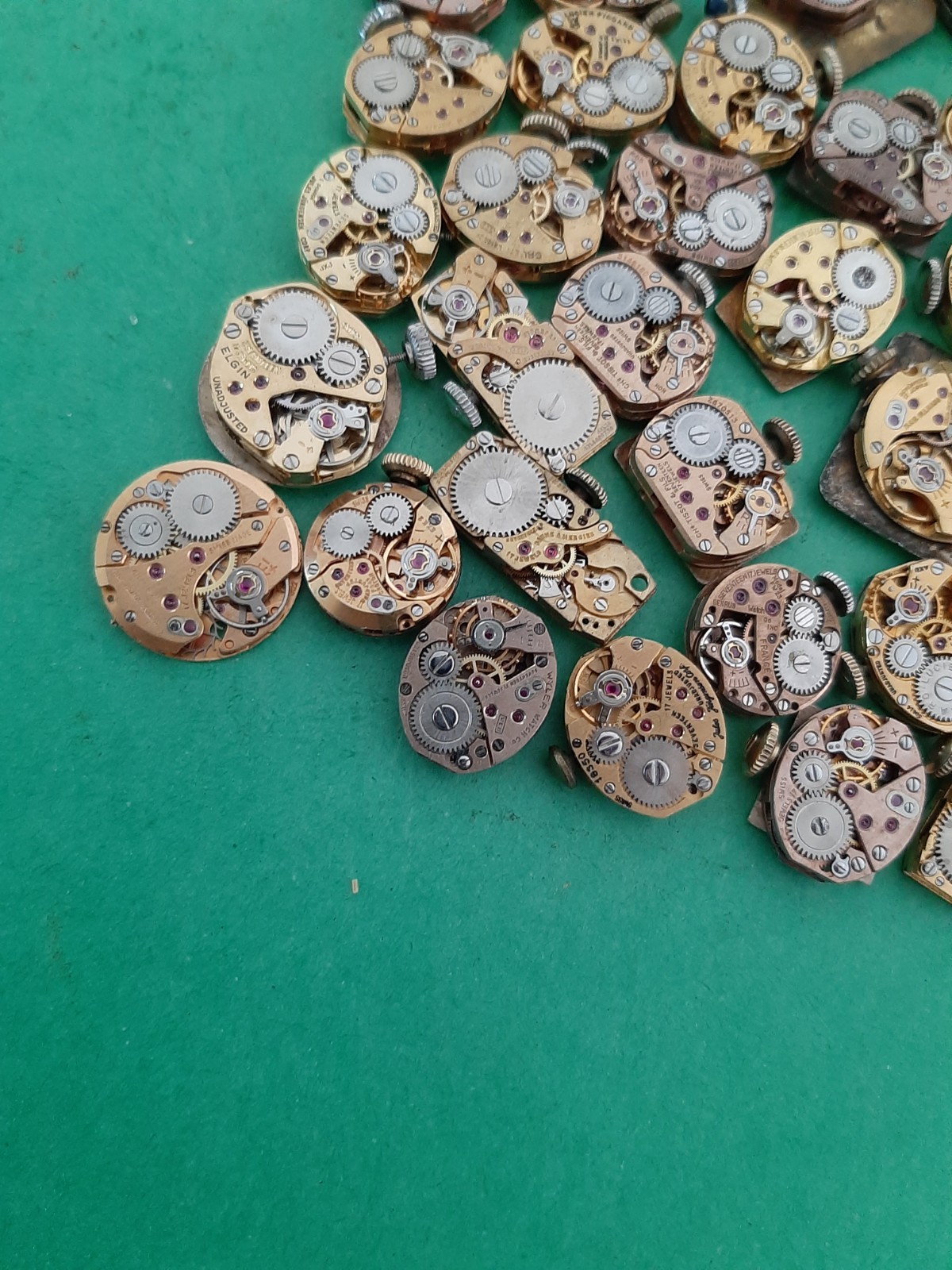 Lot of 60 Mechanical Wrist Watch Movements Parts Repair Manual Gold Cooper Tone