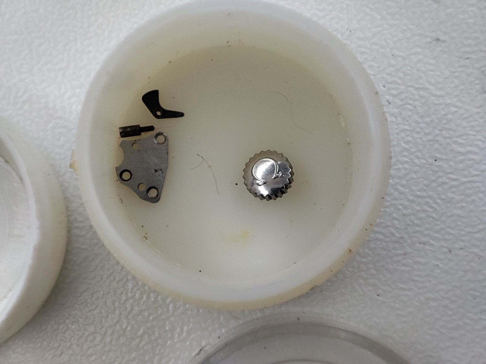 Mix watch parts OMEGA 1109 / 2401 OMEGA D.T. watchmaker crown and others