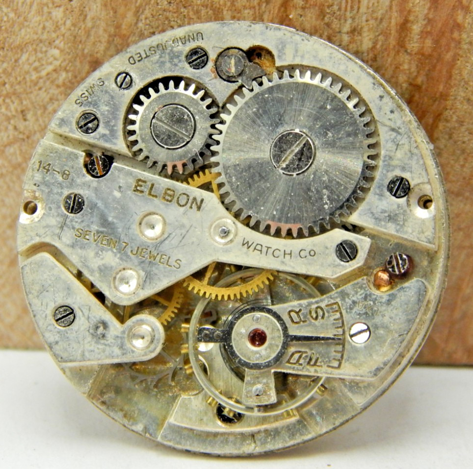 Vintage Elbon 14-8 7 jewel men’s wrist watch movement with art deco dial & hands