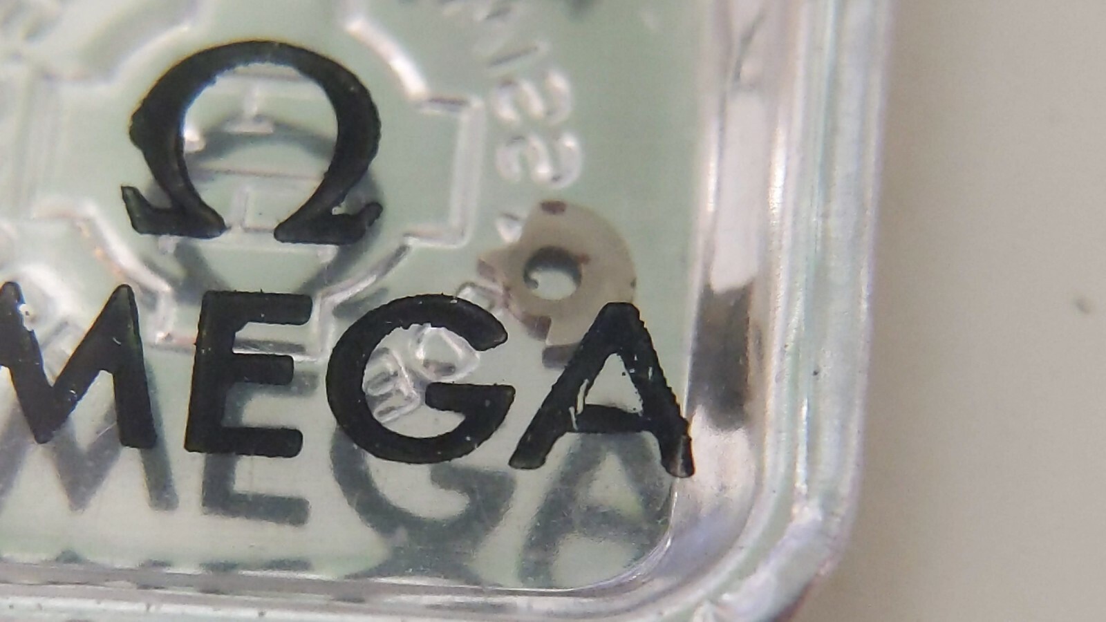 NOS Omega 260 1104 click in pack old maybe some rust – for watch repair