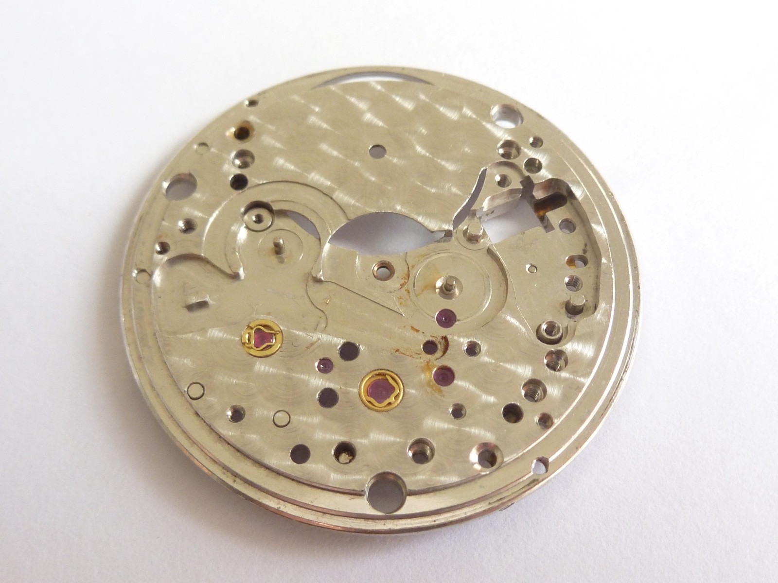 100% Authentic ROLEX 1570 Main Plate with all jewels mint condition 1530