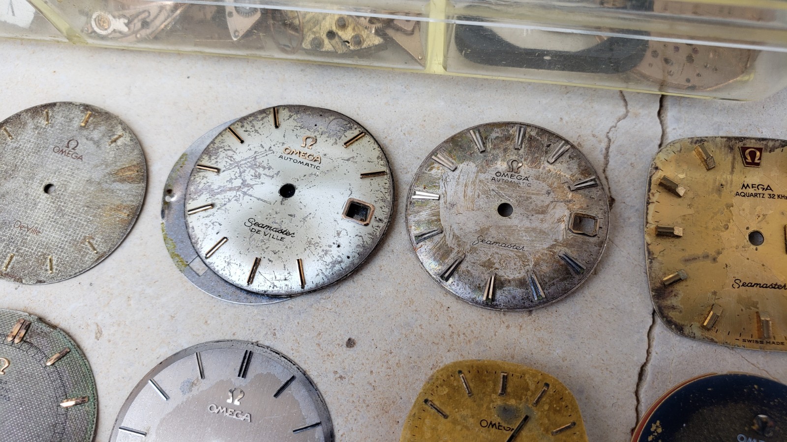 Huge Lot Of Omega Watch Movements & Dials & Parts