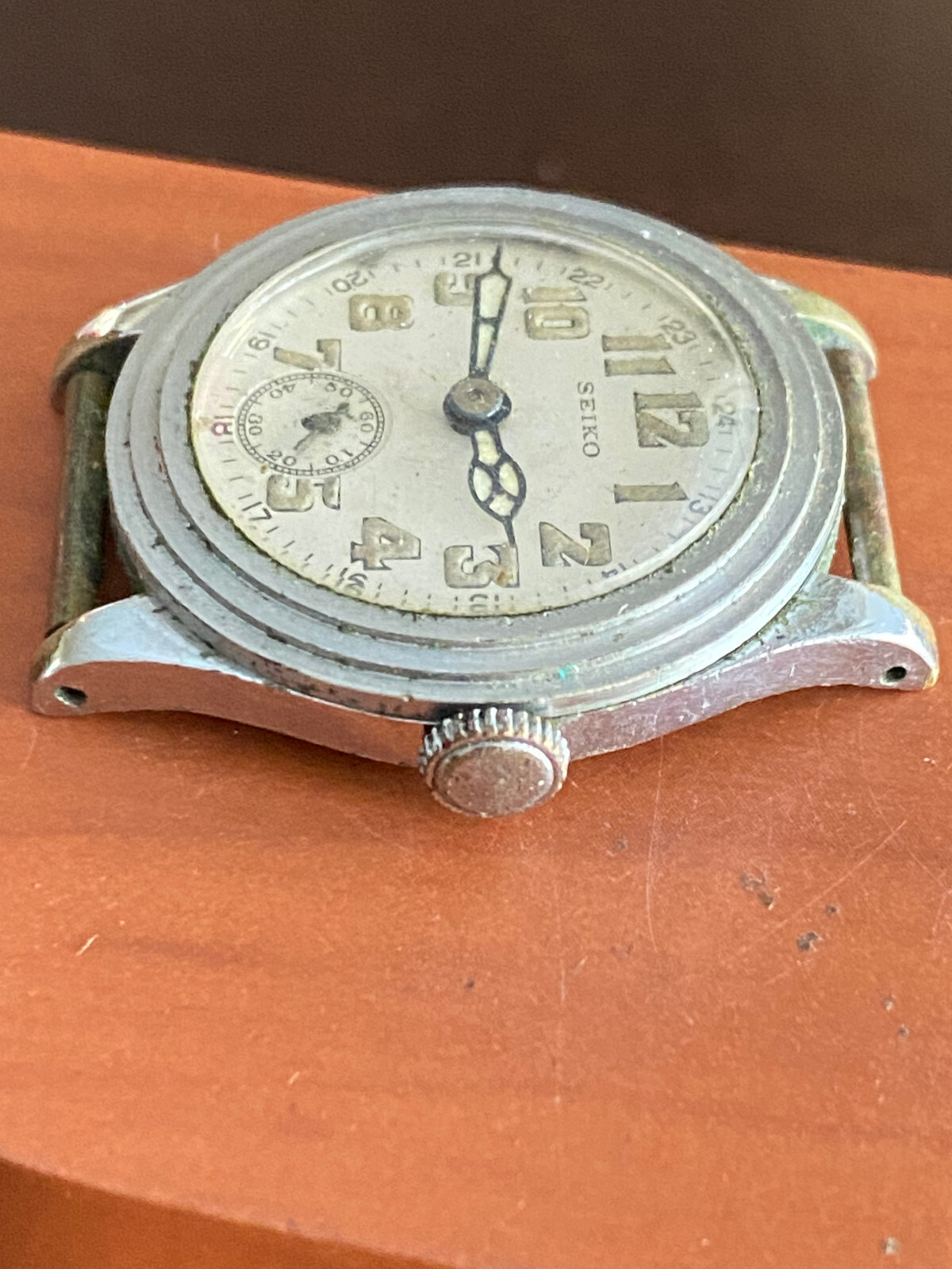 VINTAGE SEIKO WWII MILTARY DIAL. 23.65MM , MOVEMENT IS SWISS, NOT RUNNING