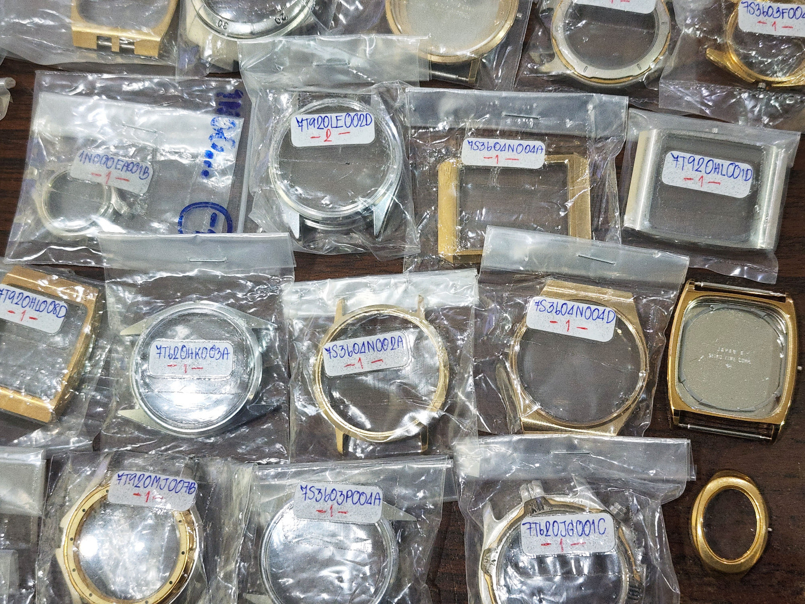 Hugh Lot 35 NOS Case Seiko watch Dress 7T62 Quartz Assorted parts Etc.