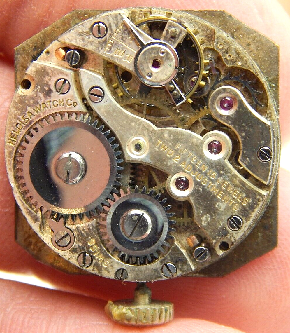 Vintage Heloisa 15 jewel 2 adjustment watch movement with dial and crown / stem