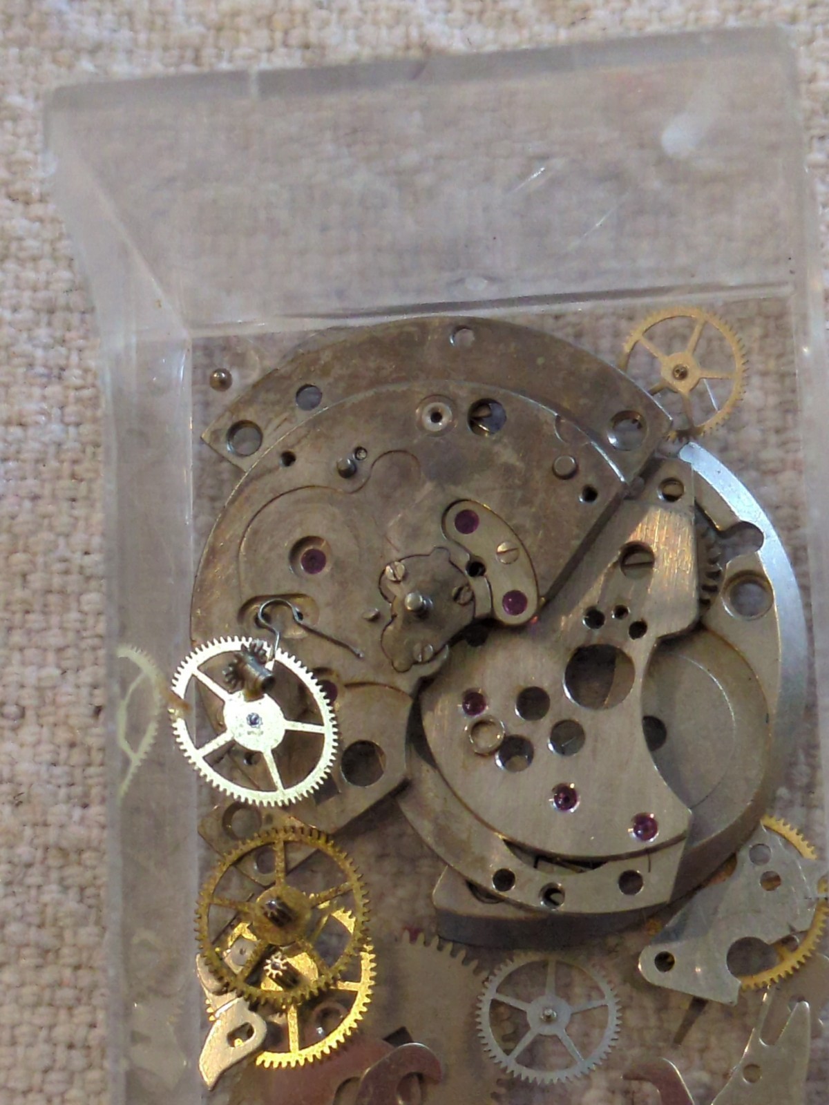 !Lot of 2 watch movements with a Box, Wheels, Plates, Screws, Springs, and more!