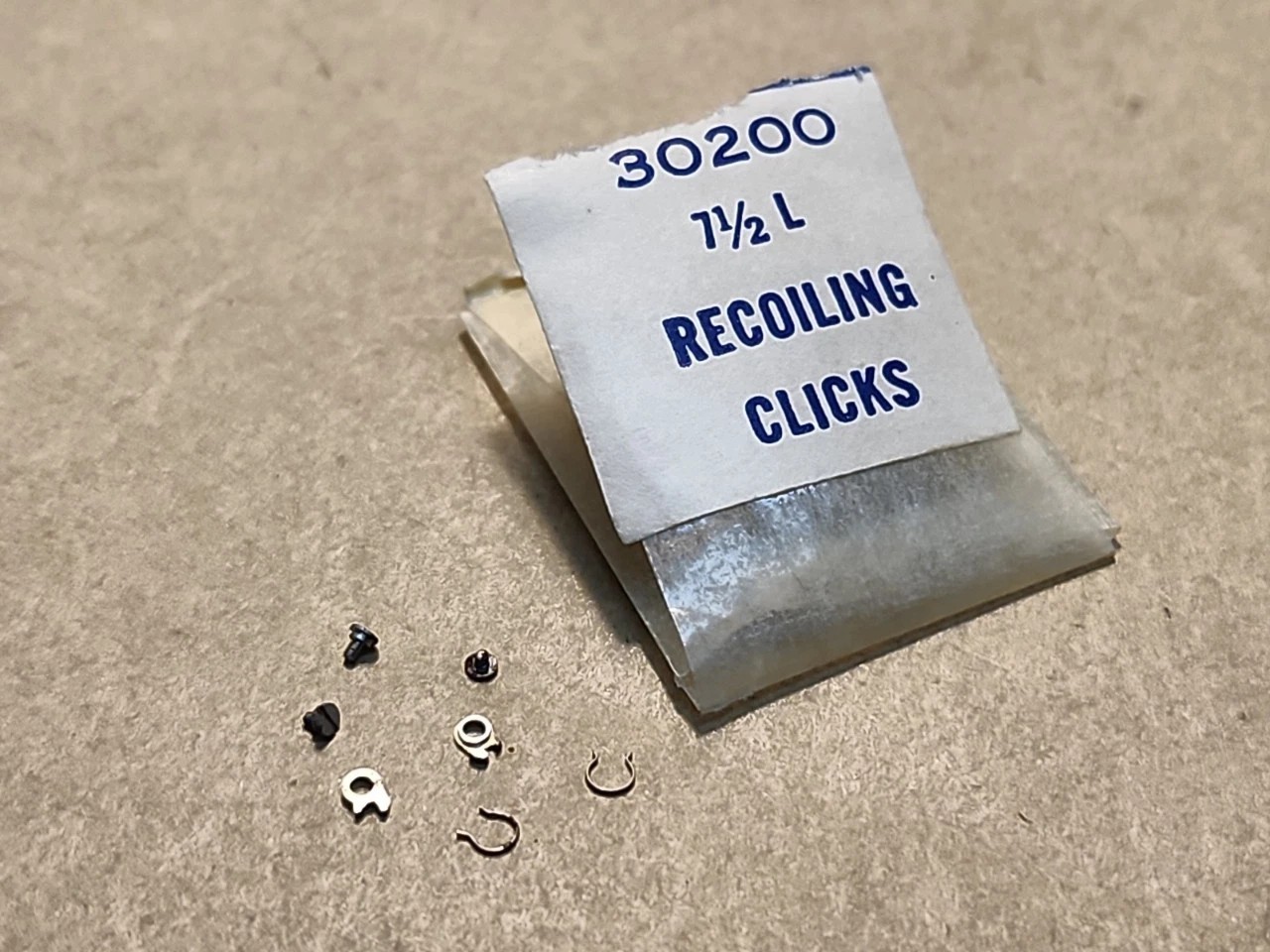 Lot Of NOS Waltham 7-1/2 Clicks & Parts