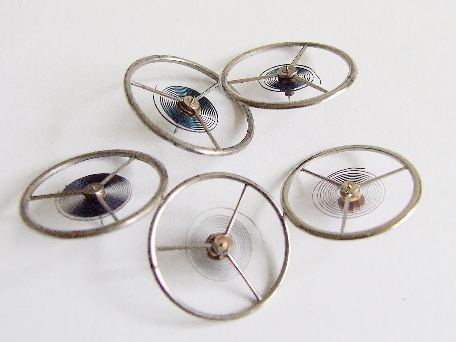 English fusee lever pocket watch balance wheels x 5. All complete parts