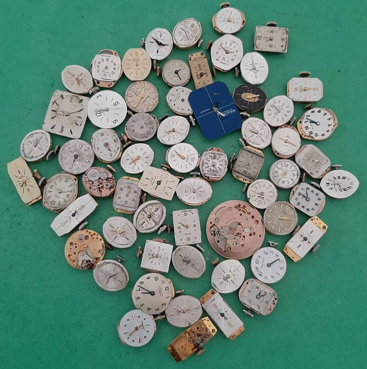 Lot of 60 Mechanical Wrist Watch Movements Parts Repair Manual Gold Cooper Tone