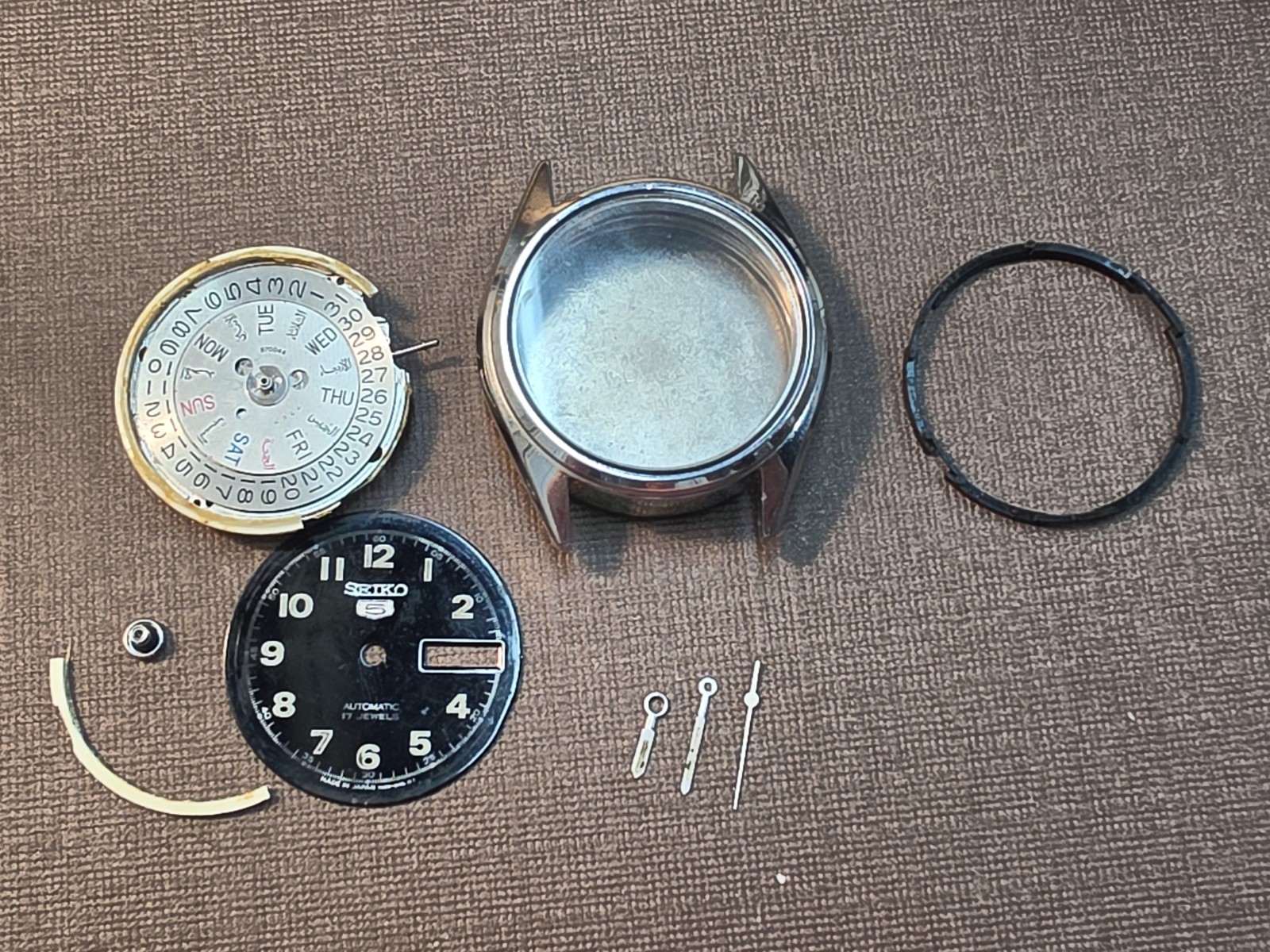 Running Seiko 7009 Mvmt W/Dial, Hands, Case, And Seiko Signed Crystal For Parts