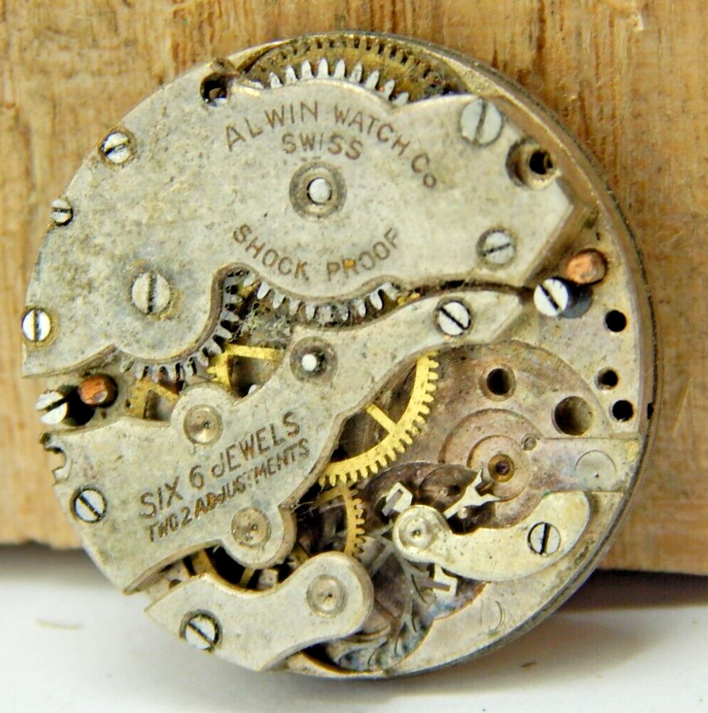 Vintage Alwin 6 jewel 2 Adjustment shock proof hunting watch movement with dial