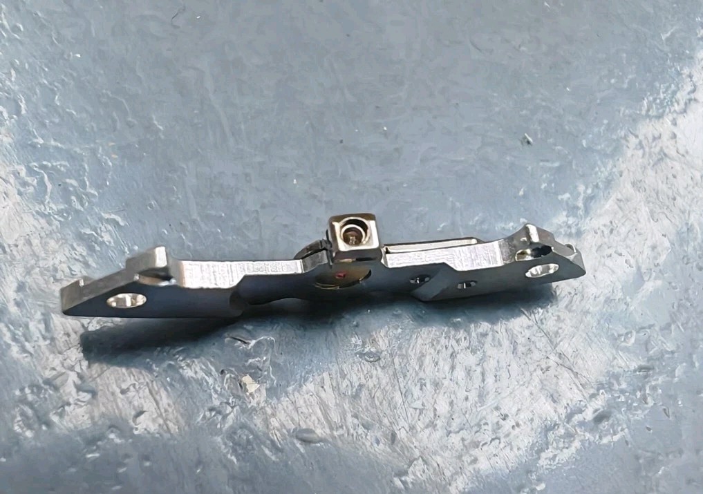 Rolex watch part 3135-120 Balance bridge Part with Jewel missing stud screw