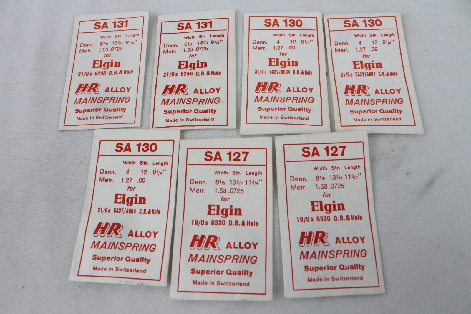 7 NOS Vintage Watch Mainspring Part HR Alloy Lot Elgin SA 130 127 131