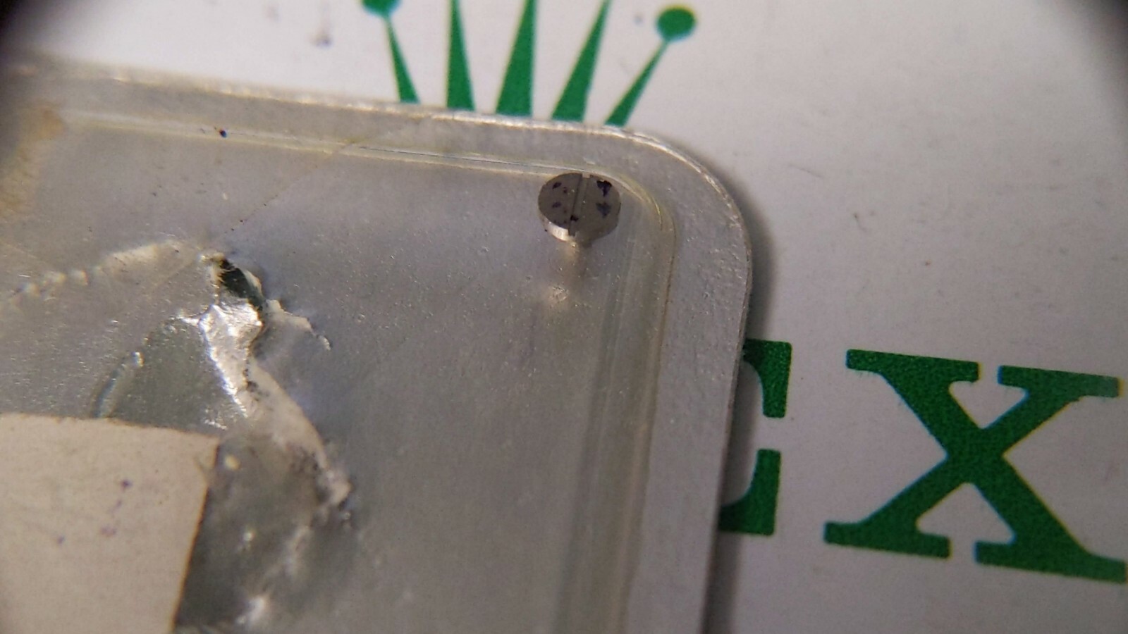 Genuine Rolex 1055 7999 screw for watch repair