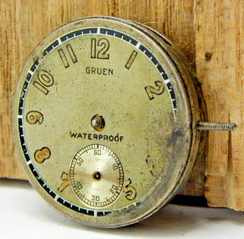 Vintage Gruen 15 Jewel 3 Adjustment 8/0 size watch movement with dial and stem