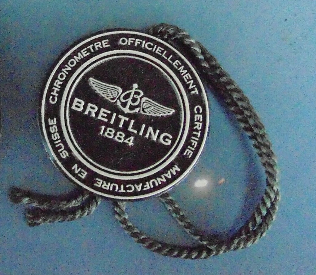 BREITLING FACTORY JEWELER’S BLACK PLASTIC WATCH HANG / SWING TAG THREE PIECE LOT