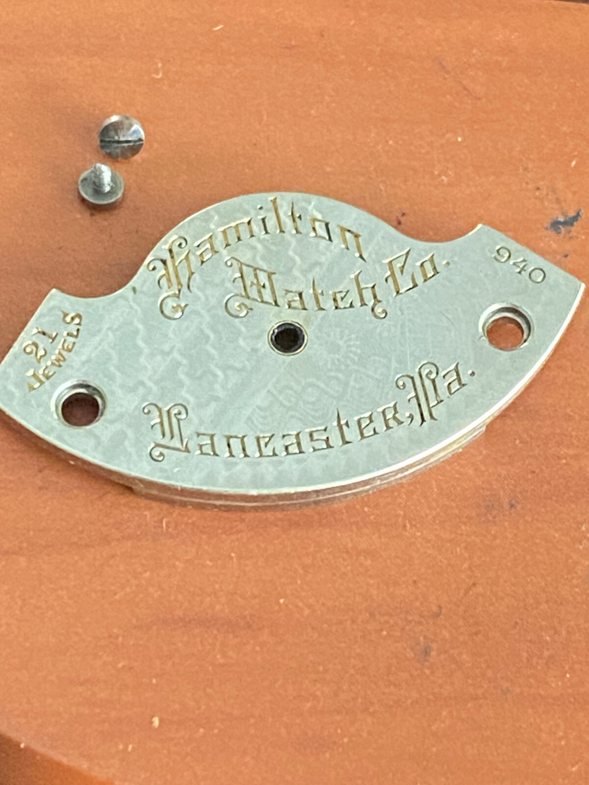 VINTAGE BARREL BRIDGE WITH SCREWS FOR 18 SIZE HAMILTON 940 , 21 JEWEL