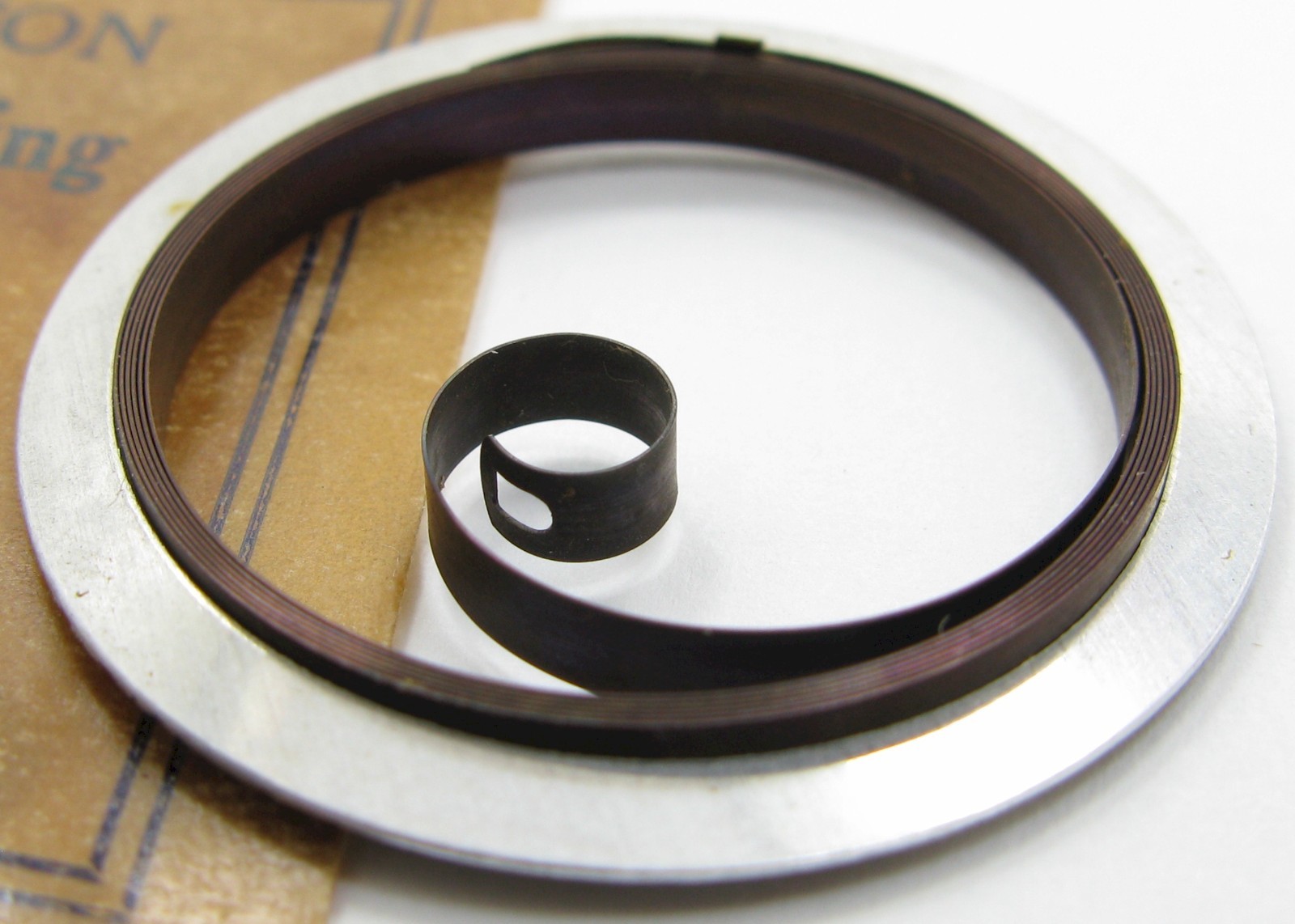 Hamilton 16s watch model 534B Motor Barrel Mainspring T end blue brown alloy