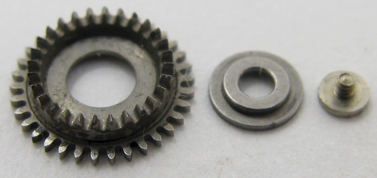 IWC c 89 Watch Part: crown wheel with its core & screw
