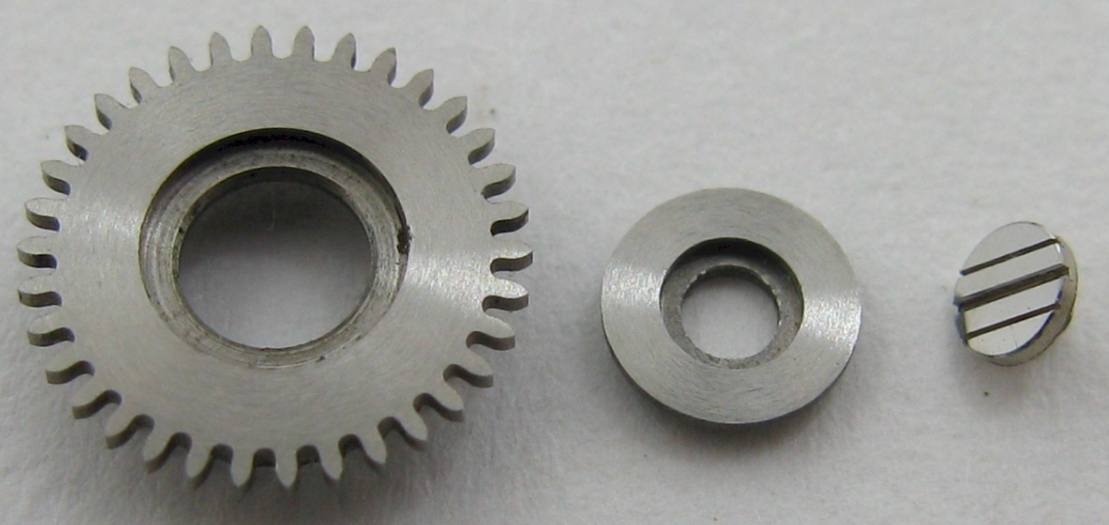IWC c 89 Watch Part: crown wheel with its core & screw