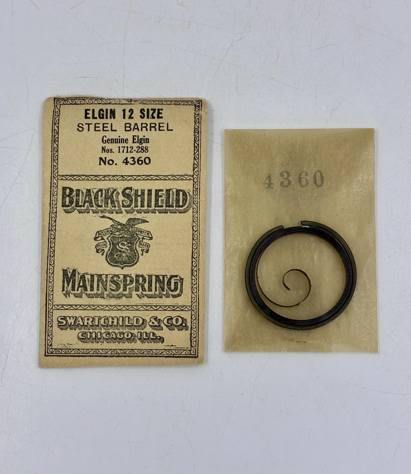 NOS Black Shield Mainspring Elgin 12 S. Steel Barrel Nos. 1712-288 No.4360