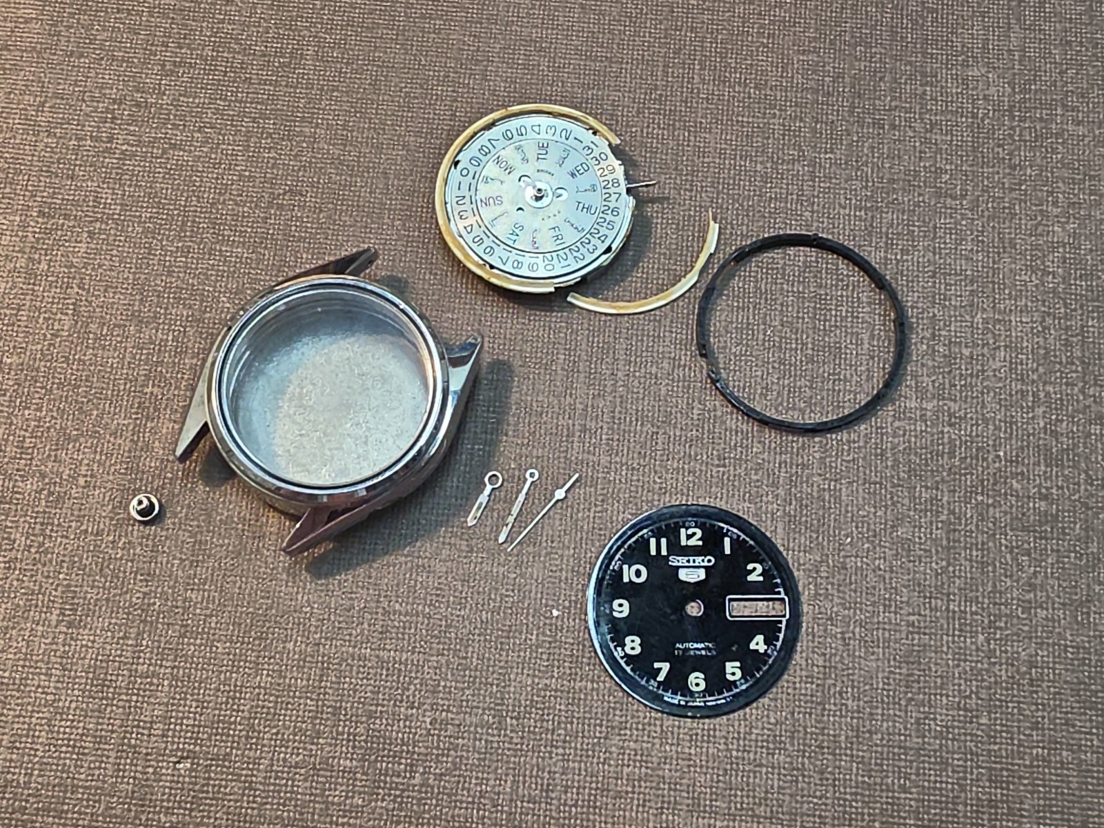 Running Seiko 7009 Mvmt W/Dial, Hands, Case, And Seiko Signed Crystal For Parts
