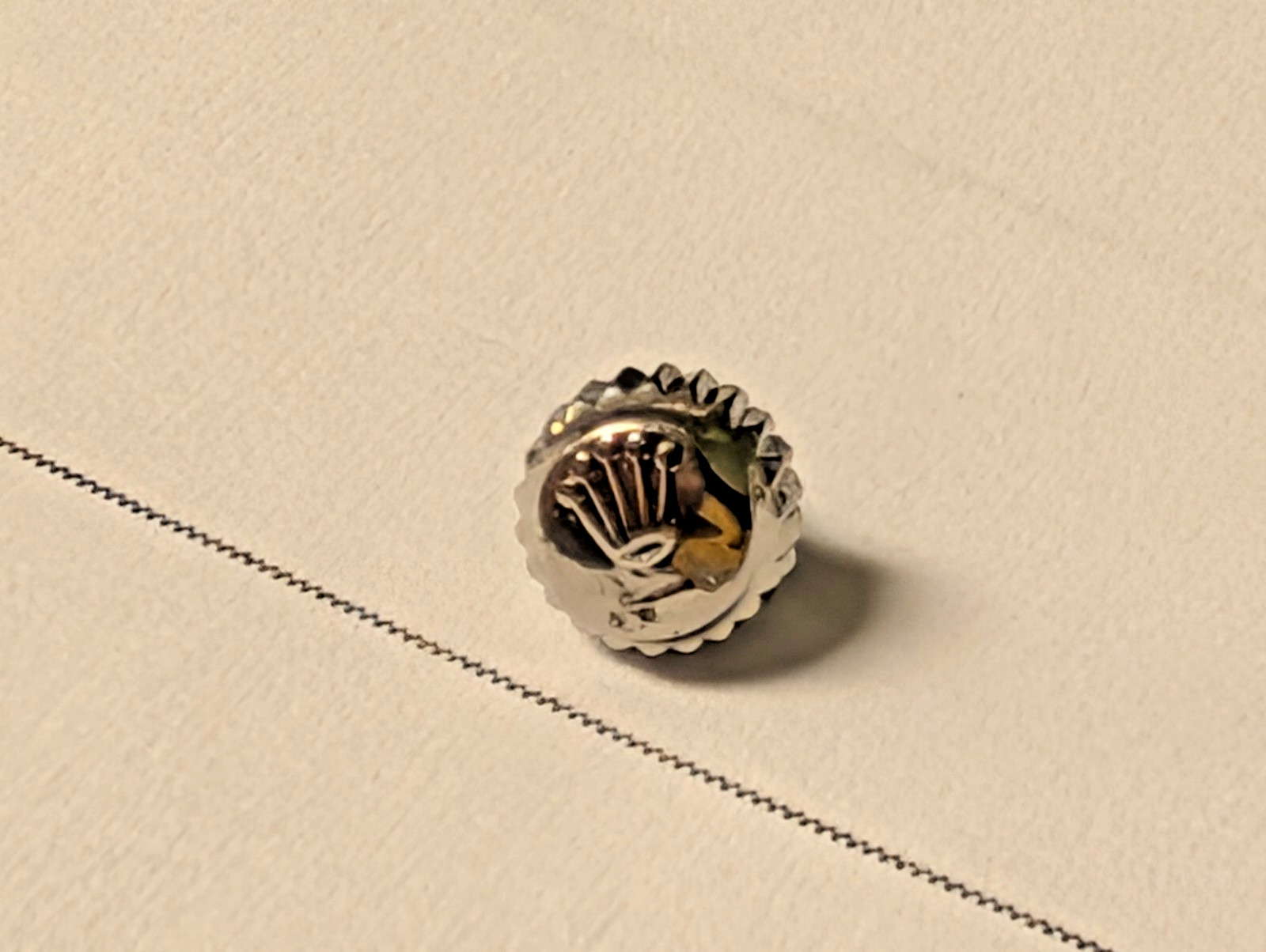 Genuine Rolex crown s/s 5.3mm with damage to face, but works