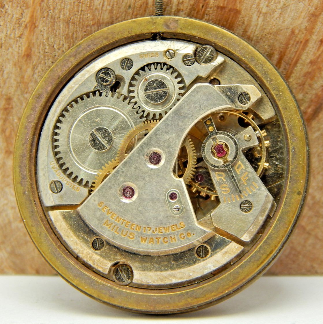 Vintage Milus 17 jewel men’s wrist watch movement with dial, hands and stem