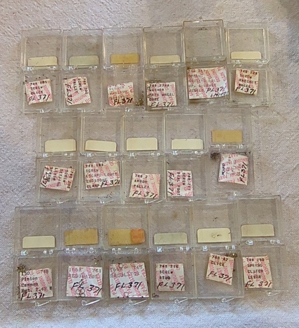 17 Boxes of Elgin 748 Movement Unused Jewels, Screws, Wheels, Regulators Etc…!