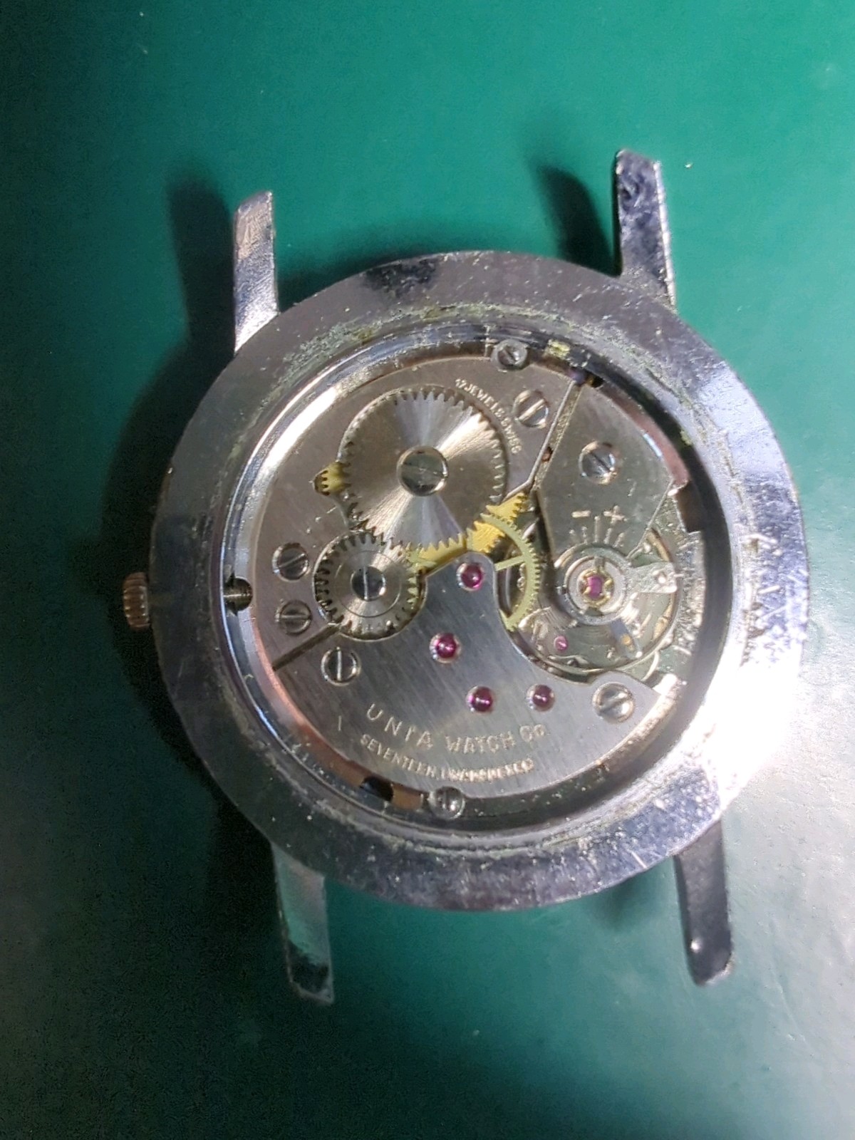 UNIA Ultra-thin Movement, Running. With Case And Caseback, No Crystal, Bad Dial