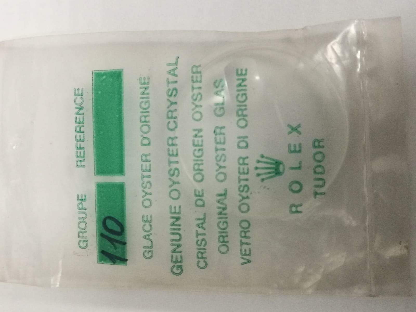 ROLEX/TUDOR: VINTAGE PLASTIC GLASS. 25/110