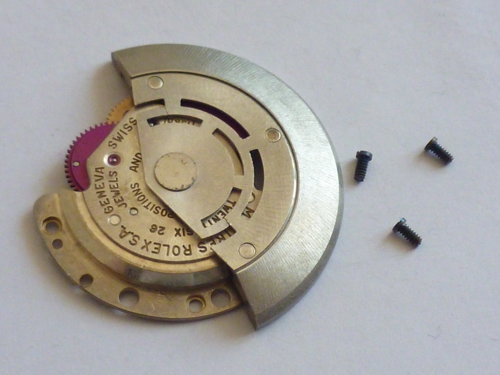 GENUINE Authentic Rolex Rotor + bridge 1560 perfect condition completely screw