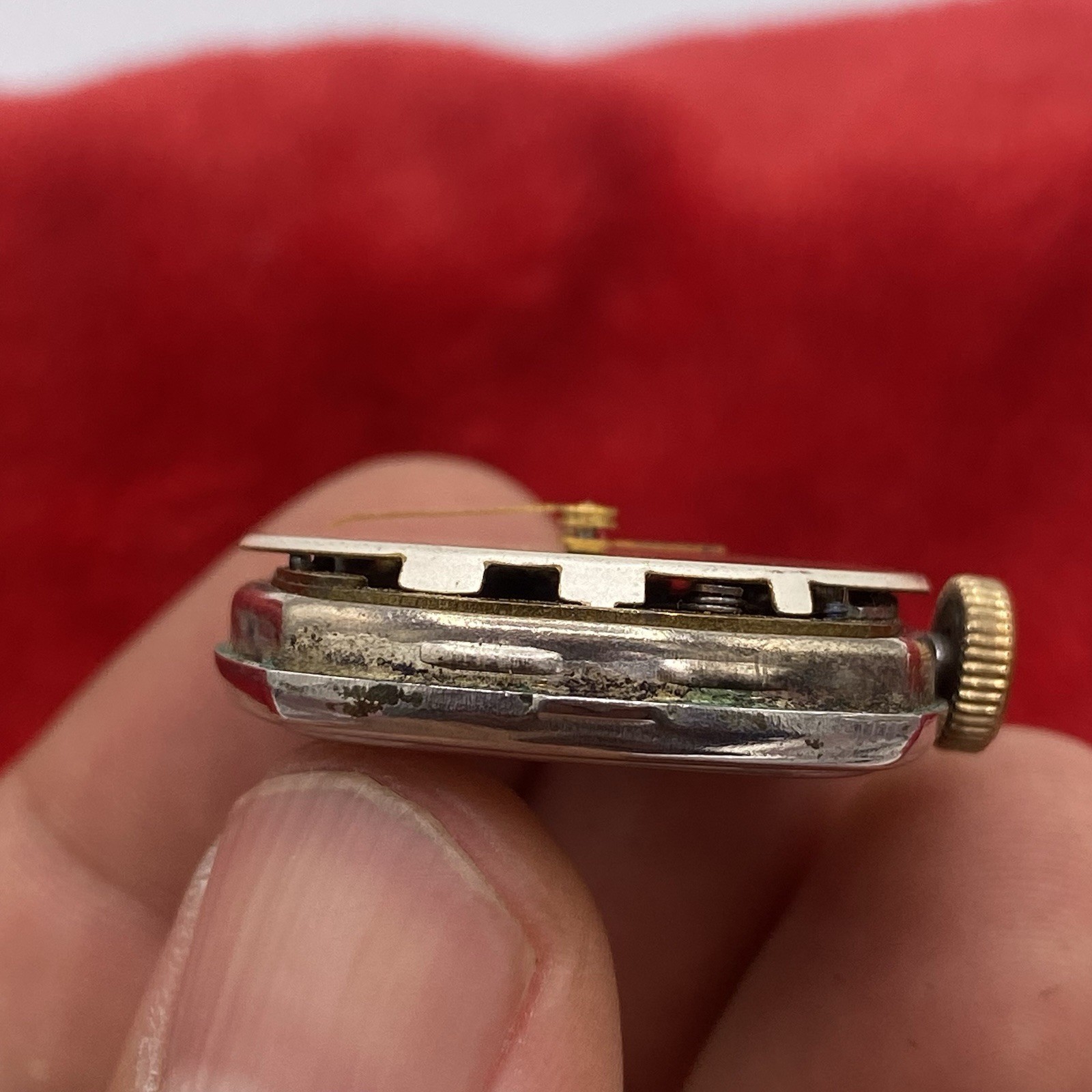 Antique Ingersoll watch movement w dial and hands for parts or repair Made USA