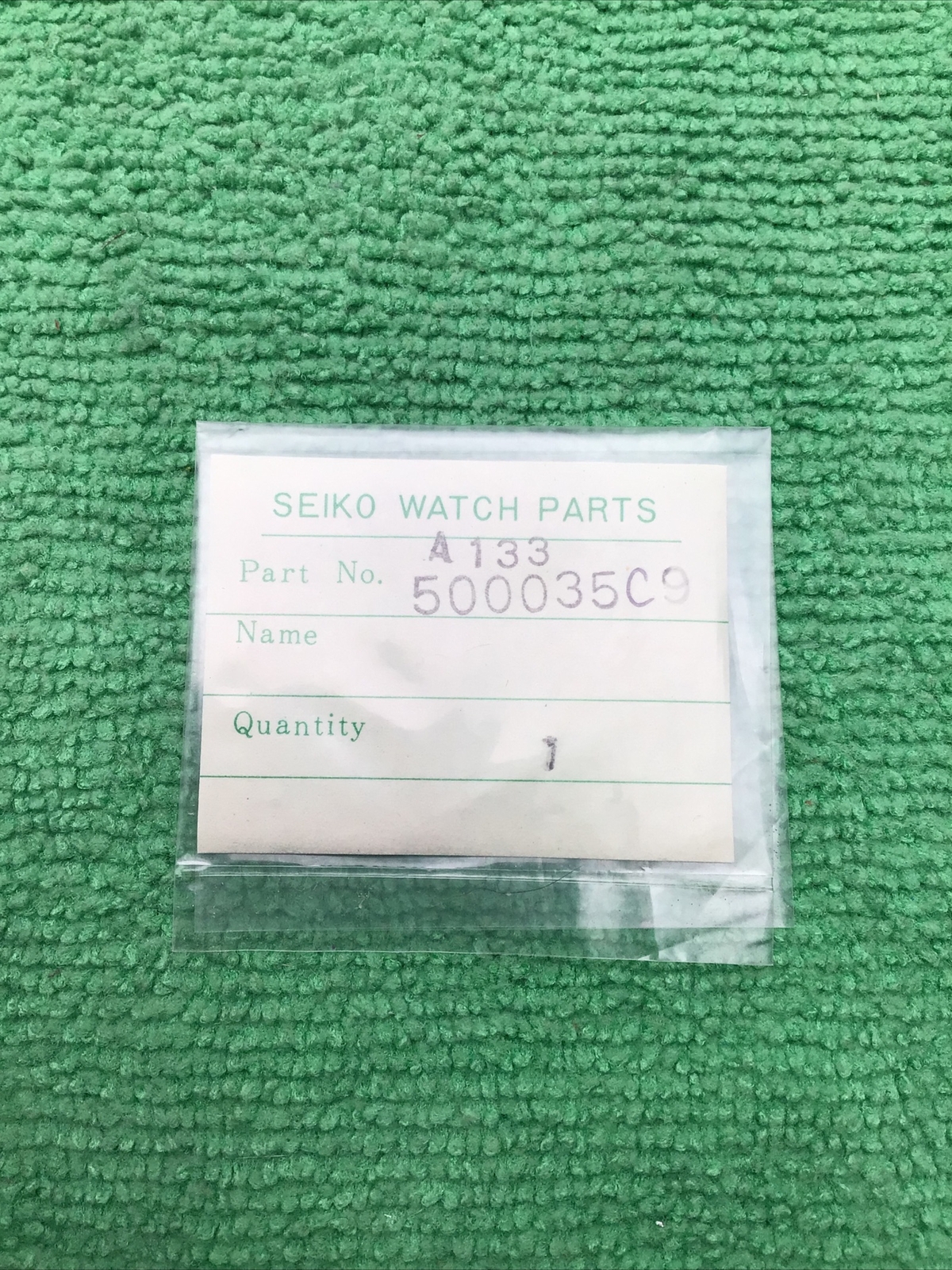 Genuine Seiko A133 500035C9 Panel Cover Quartz LC Watch Part