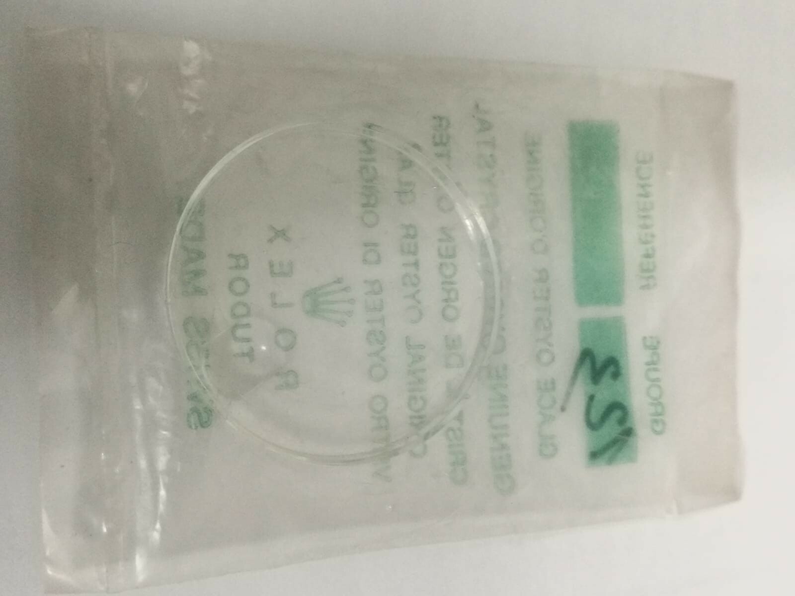 TUDOR ROLEX: VINTAGE PLASTIC GLASS.25/123