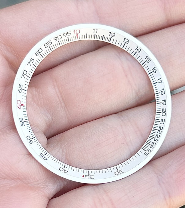 A Breitling Chronograph Navitimer Wristwatch Tachy meter inner bezel.