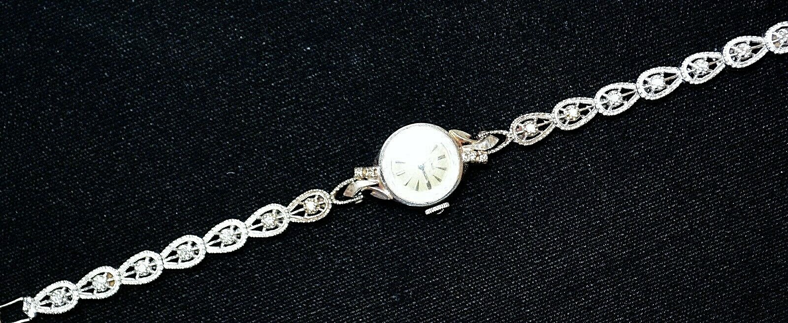 LADY’S LONGINES 14K SOLID WHITE GOLD.18 DIAMONDS WATCH.ORIGINAL DIAL