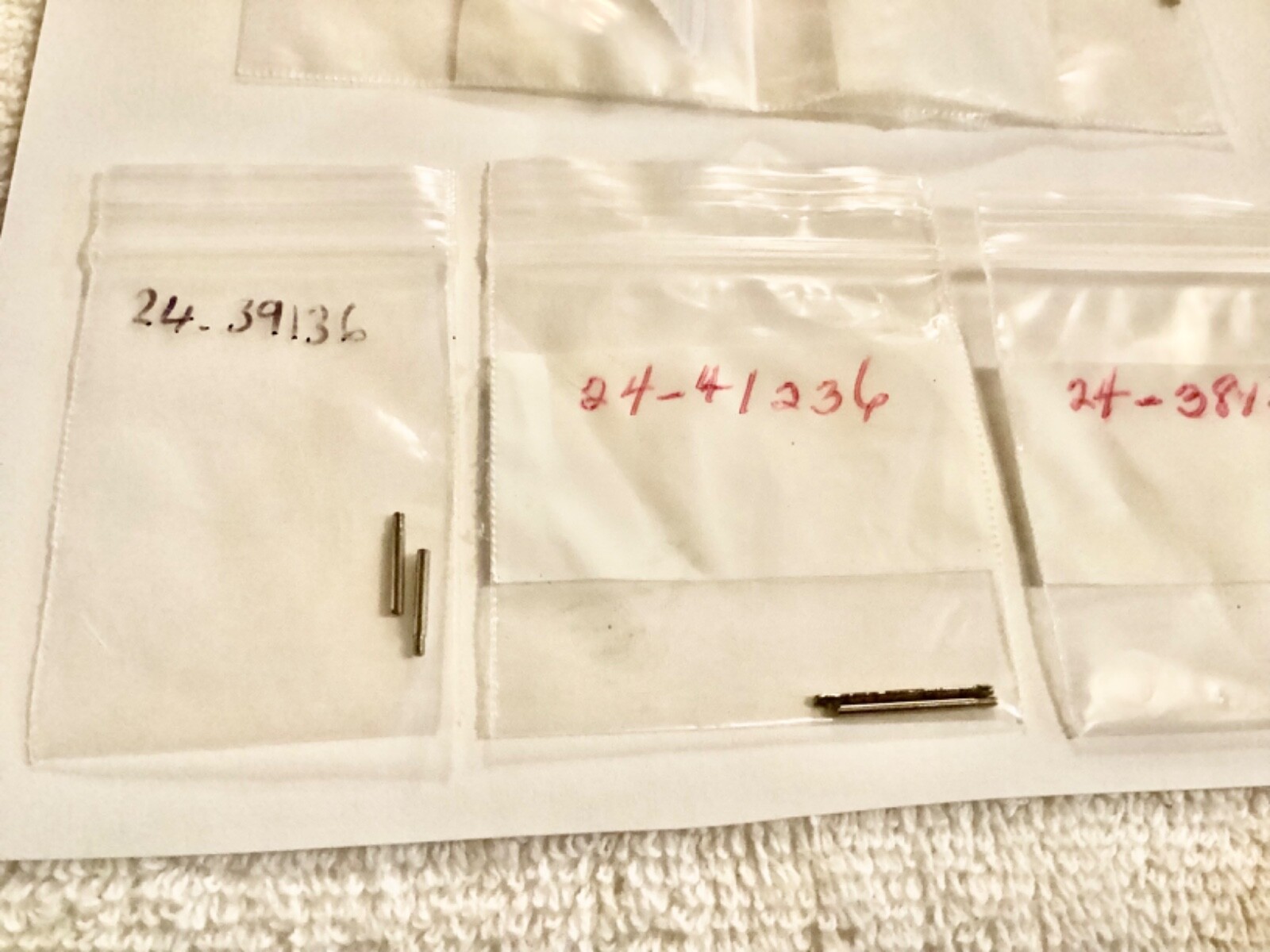 watch band pins unkown parts some with numbers